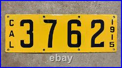 1915 California license plate 3762 porcelain yellow black second year low number