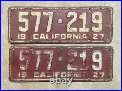 1927 California license plate pair 577 219 white on maroon embossed garage SBNC