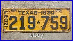 1930 Texas license plate 219-759 embossed blue on yellow