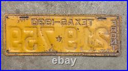 1930 Texas license plate 219-759 embossed blue on yellow