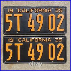 1935 California license plate pair 5T 49 02 yellow on black embossed garage SBNC