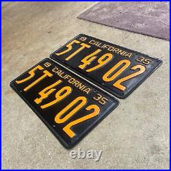 1935 California license plate pair 5T 49 02 yellow on black embossed garage SBNC