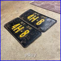 1936 New York license plate pair 4H 8 yellow on black embossed low number