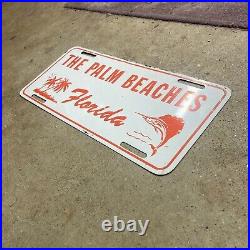 1960s 1970s Florida the Palm Beaches license plate red on white graphic marlin