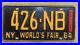 1964_New_York_license_plate_426_NB_orange_on_black_embossed_Dodge_HEMI_1965_01_jos