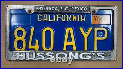 1970 California license plate 840 AYP Hussong's Ensenada frame Baja Mexico