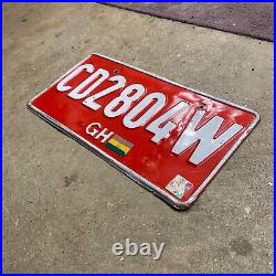 1990s Ghana license plate CD 2804 W white on red embossed Africa diplomatic