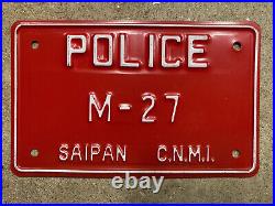 1990s Saipan license plate M-27 police motorcycle CNMI white on red embossed