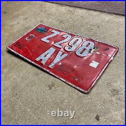 1990s Tanzania taxi license plate Z 298 AY white on red embossed Africa