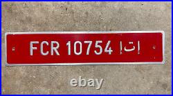 1990s Tunisia export license plate FCR 10754 white on red embossed Africa