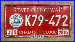 2015 Ngiwal Palau license plate K79-472 white on red embossed Micronesia