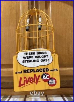 AC Spark Plug Bird Cage Caught Stealing Gas Station Oil Sign Vintage Style Decor