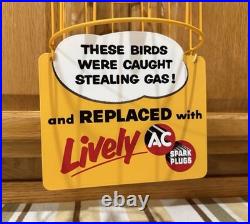 AC Spark Plug Bird Cage Caught Stealing Gas Station Oil Sign Vintage Style Decor