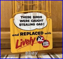 AC Spark Plug Bird Cage Caught Stealing Gas Station Oil Sign Vintage Style Decor