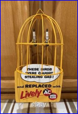 AC Spark Plug Bird Cage Caught Stealing Gas Station Oil Sign Vintage Style Decor