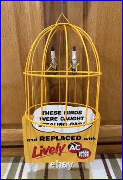 AC Spark Plug Bird Cage Caught Stealing Gas Station Oil Sign Vintage Style Decor