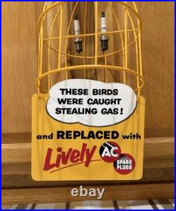 AC Spark Plug Bird Cage Caught Stealing Gas Station Oil Sign Vintage Style Decor