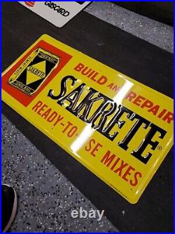 C. 1960s Original Vintage Sakrete Cement Mixes Sign Metal Embossed NOS Gas Oil
