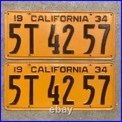 California 1934 license plate pair 5T 42 57 black on yellow embossed garage SBNC