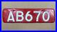 Fiji_taxi_license_plate_AB_670_1950s_1960s_white_on_red_01_cpv