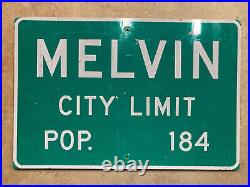 Melvin Texas city limit road sign highway 1999 white green population 184 HDOS