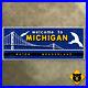 Michigan_state_line_highway_marker_road_sign_1957_water_wonderland_27x11_01_kvyc