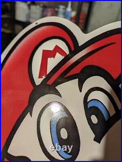 Nintendo service metal Mario sign