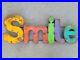 ORIGINAL_Vtg_1970s_SMILE_Rust_Metal_Store_Display_Barn_Sign_Spell_Out_Word_01_zox