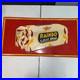 RAINBO_BREAD_STAMPED_PAINTED_METAL_GROCERY_SIGN_1950s_VINTAGE_27x14_01_zs