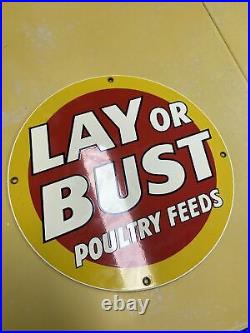 Rare Look Metal Sign-Lay or Bust Poultry Feeds 11.5 Round