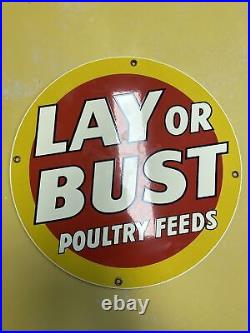 Rare Look Metal Sign-Lay or Bust Poultry Feeds 11.5 Round