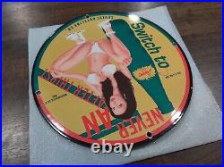 Squirt metal sign Pinup Girl