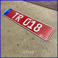 Turkish Republic of Northern Cyprus TRNC taxi license plate TR 018 white on red