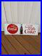 VINTAGE_NOS_1960_s_COCA_COLA_THINGS_GO_BETTER_WITH_COKE_BUTTON_SODA_METAL_SIGN_01_awxz