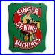 Vintage_1930_s_Singer_Sewing_Machine_Porcelain_Metal_2_Sided_Sign_EXCELLENT_COND_01_hk