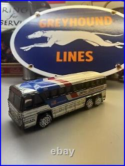Vintage Greyhound Toy Bus And Metal Sign