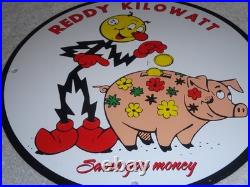 Vintage Reddy Kilowatt Piggy Bank Saves $$ 11 3/4 Porcelain Metal Gasoline Sign