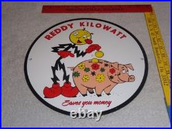 Vintage Reddy Kilowatt Piggy Bank Saves $$ 11 3/4 Porcelain Metal Gasoline Sign