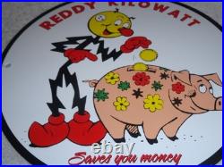 Vintage Reddy Kilowatt Piggy Bank Saves $$ 11 3/4 Porcelain Metal Gasoline Sign