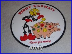 Vintage Reddy Kilowatt Piggy Bank Saves $$ 11 3/4 Porcelain Metal Gasoline Sign