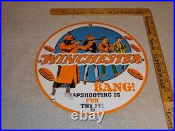Vintage Winchester Woman & Men Shooting Guns 11 3/4 Porcelain Metal Bullet Sign