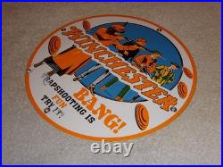 Vintage Winchester Woman & Men Shooting Guns 11 3/4 Porcelain Metal Bullet Sign