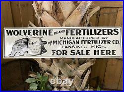 Vintage Wolverine Fertilizer Embossed Metal Sign Porcelain Farm Michigan Gas Oil