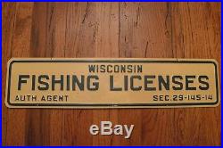 Vintage metal double-sided Wisconsin Fishing Licenses sign point of sale