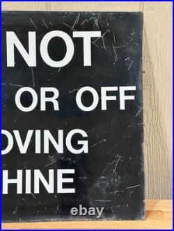 Vintage metal industrial sign Do not get on or off moving machine 18 x 24