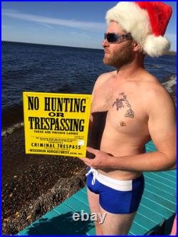 Vintage old Wisconsin Criminal No Hunting or Trespassing Metal Sign Racine Wis